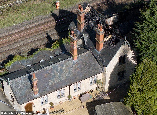 96707343-14552241-A_child_is_one_of_three_victims_killed_in_the_fire_at_at_a_histo-a-84_1743344786333.jpg