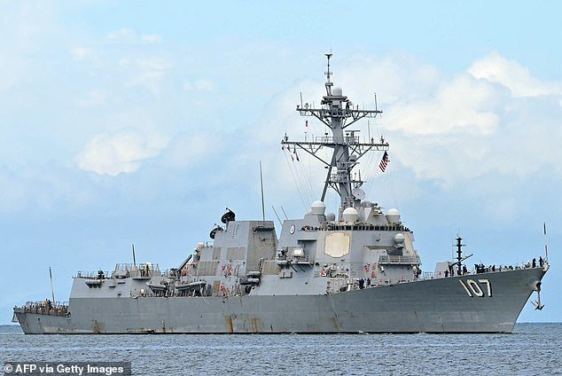 103346651-15231033-The_USS_Gravely_steams_into_the_Port_of_Spain_in_Trinidad_and_To-a-18_1761576892067.jpg