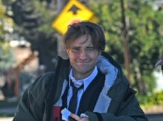 Robert Pattinson luce un espectacular ojo morado cuando se le ve por primera vez en el set de la próxima película sobre atracos Here Comes The Flood en Nueva Jersey.