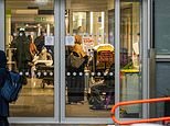 104571779-0-Pictured_patients_queue_on_trollies_to_get_into_A_E_this_morning-a-4_1765369821917.jpg