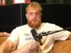 Jake Paul, maltratado y magullado, lucha por hablar en un podcast después de la pelea con Anthony Joshua